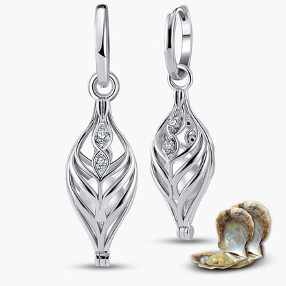 Boucles d'oreilles Dualis + 2 huîtres