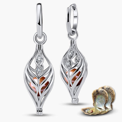 Boucles d'oreilles Dualis + 2 huîtres